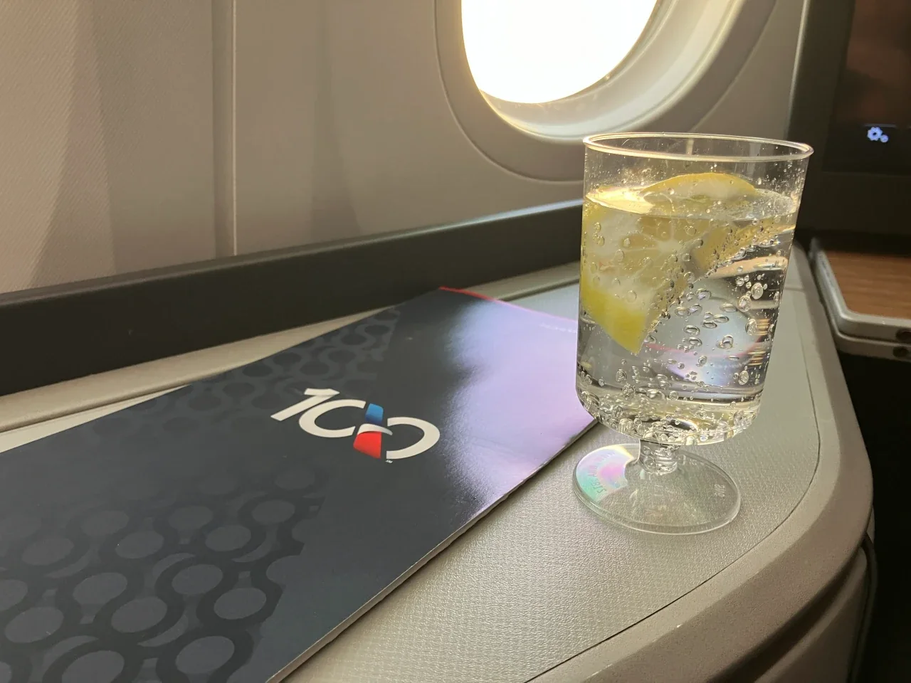 AA 235 FCO–JFK predeparture drink